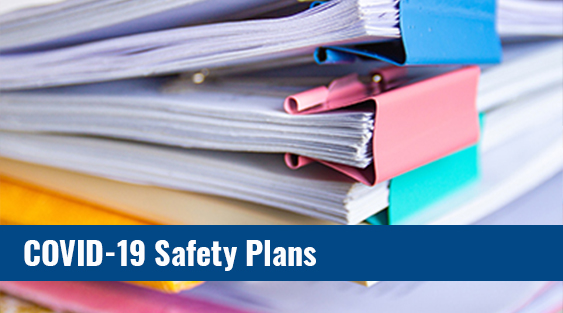 Photo of A stack of papers with COVID-19 Safety Plan text over it