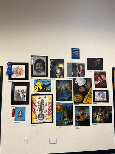 A wall of student artwork